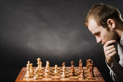 Man at chess board